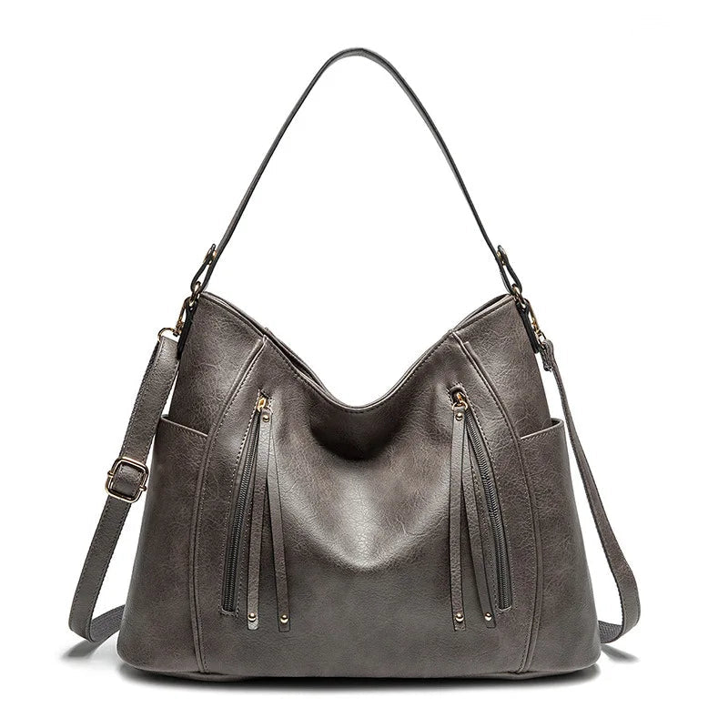 Wendy™ | Bolsa con Flecos